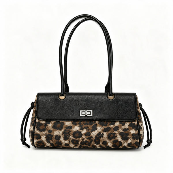 Compact two-tone quilted shoulder bag with black leather-look flap, silver turn-lock clasp, diamond-quilted body, side