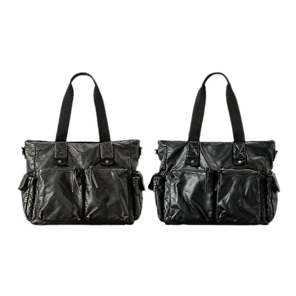 Slouchy crinkled pebbled leather-look convertible tote bag in gunmetal black with woven top handles, adjustable shoulder