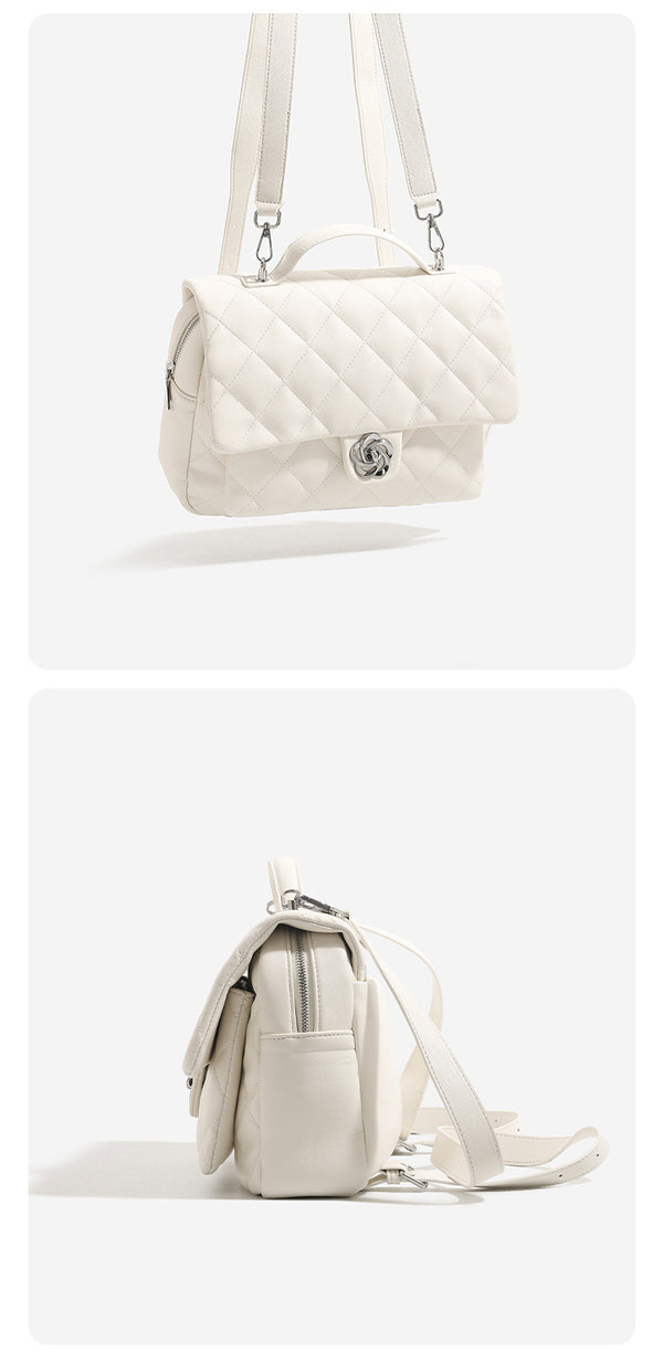 Diamond-quilted flap backpack handbag with silver-tone flower turn-lock, top handle, and dual shoulder straps, detail view 13