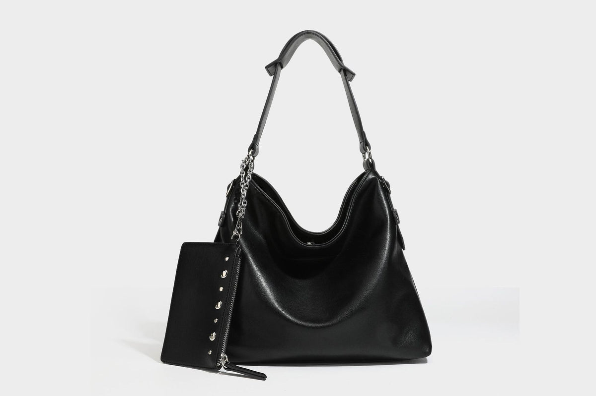 Large slouchy hobo shoulder bag in dark brown with smooth leather-look finish, adjustable strap, and silver-tone hardware