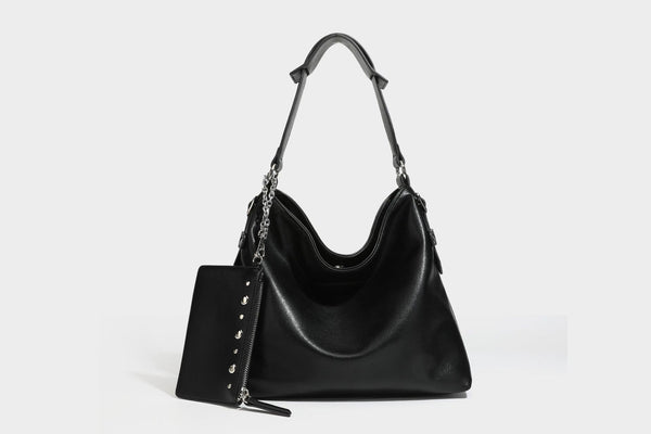 Large slouchy hobo shoulder bag in dark brown with smooth leather-look finish, adjustable strap, and silver-tone hardware