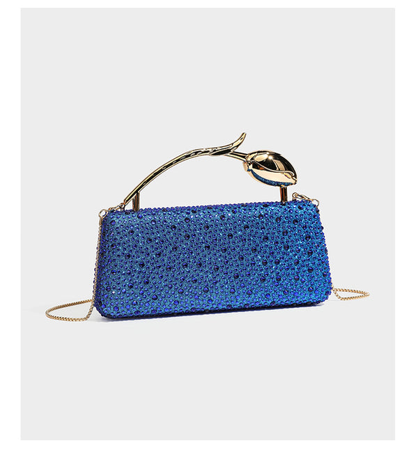 rectangular hard-case rhinestone evening clutch with sculptural gold-tone branch-and-bud top handle and detachable chain