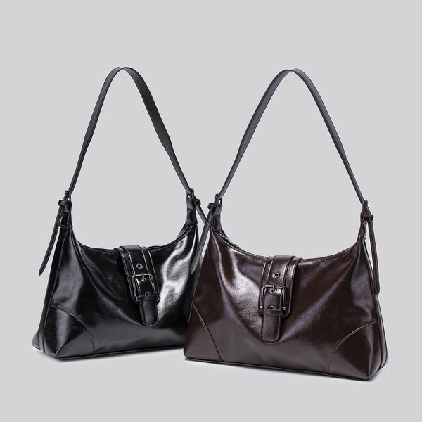 Glossy dark brown slouch hobo shoulder bag with front buckle strap panel and long adjustable single strap, detail view 2