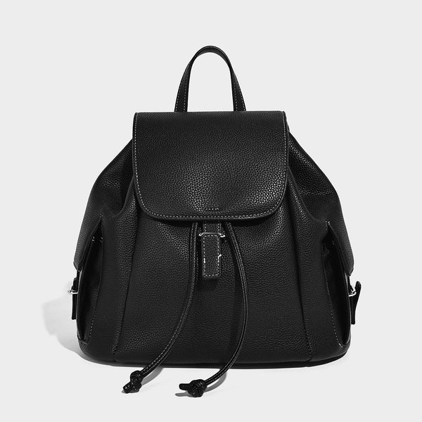 Compact pebbled leather-look flap drawstring backpack handbag with side pockets, top handle, and silver-tone hardware, detail
