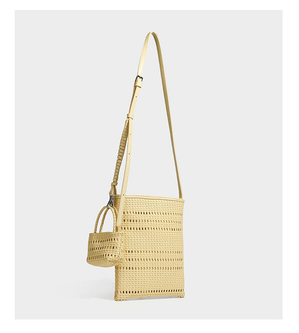 Kleine rechteckige Crossbody-Tasche aus offen geflochtenem Material mit passendem Mini-Täschchen und verstellbarem schmalem Riemen, Detailansicht 22