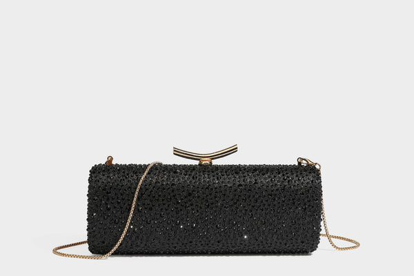 Structured rectangular hard-case clutch bag covered in all-over rhinestone crystal embellishment with curved kiss-lock top