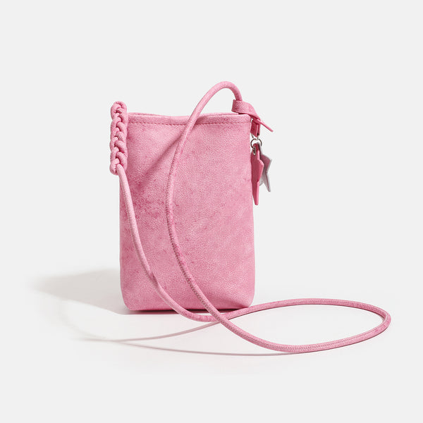 Small vertical textured mini crossbody phone bag with long braided cord strap and silver-toned star charm, detail view 3