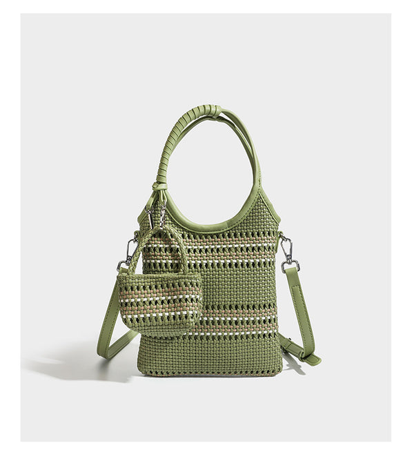 Color-block woven tote bag with rounded leather-look handles, detachable crossbody strap, and matching mini clip-on pouch in