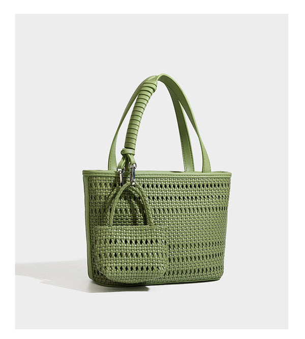 Structured open-weave tote bag with smooth leather-look trim, double top handles, detachable crossbody strap, and mini zip