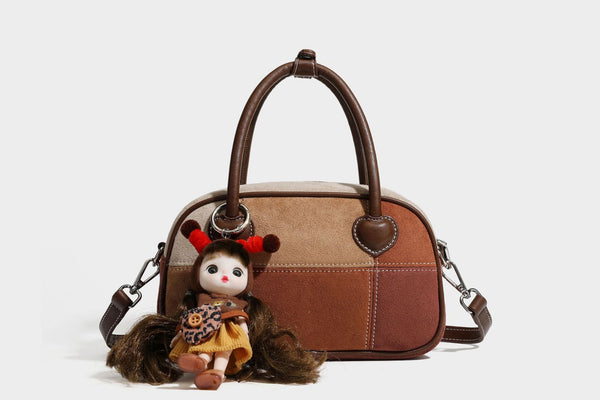 Kleine, strukturierte Henkeltasche aus Patchwork in Farbblöcken aus Beige, Camel, Braun und Rost mit dunkelbrauner Einfassung, herzförmigem