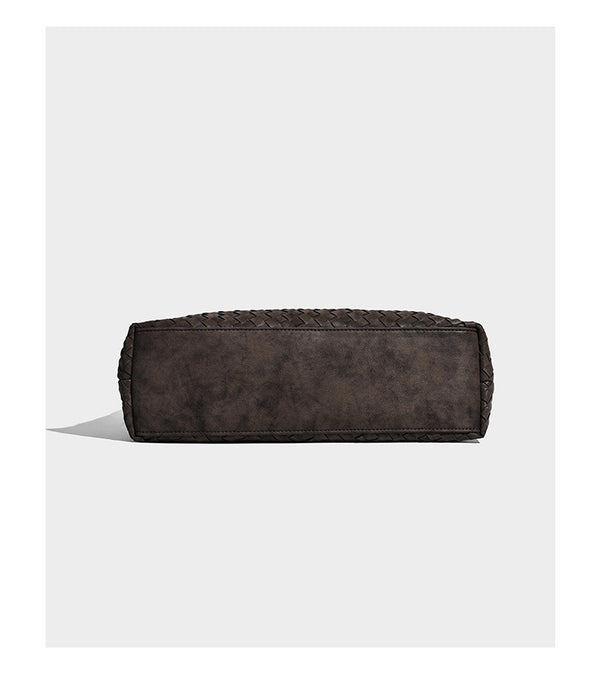 Slouchy woven hobo shoulder bag with knotted strap and matte leather-look textured finish, detail view 12