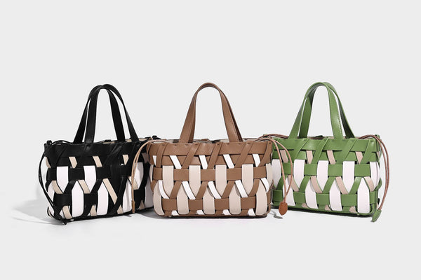 Small structured woven lattice tote bag with dual top handles and detachable shoulder strap in brown and cream leather-look