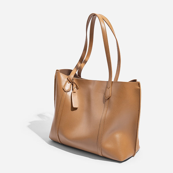 Large structured leather-look tote bag with belt-strap detail and gold-tone hardware, detail view 2