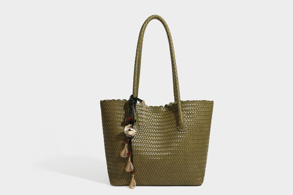Large open-top woven leather-look tote bag in dark brown with scalloped edge, braided double shoulder straps, and decorative