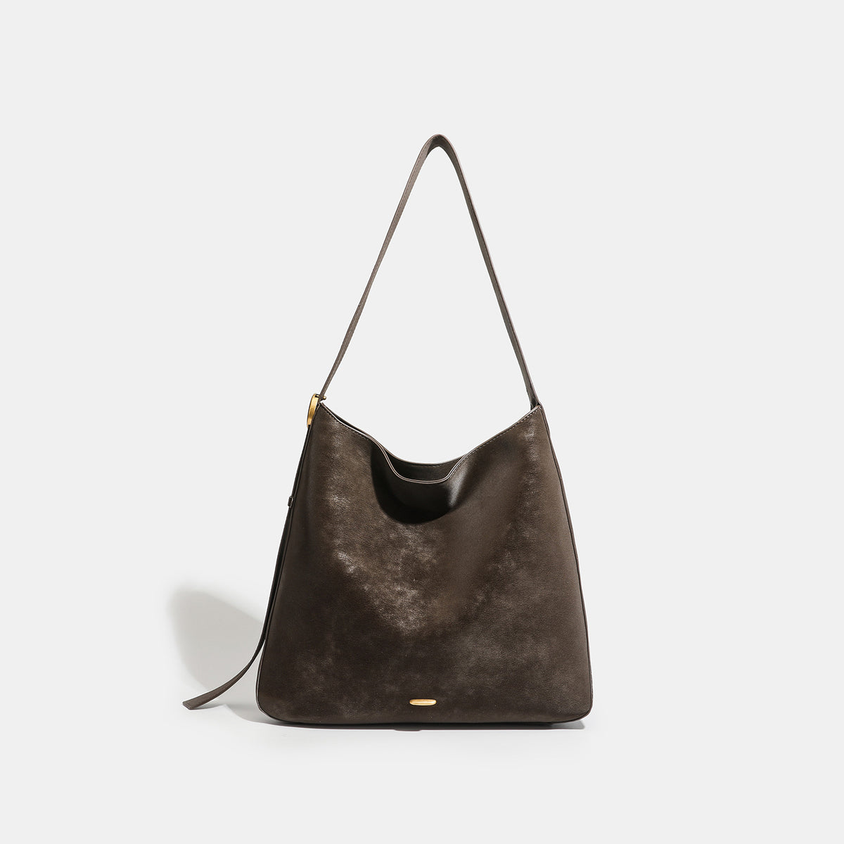 Large slouchy hobo tote bag in distressed dark brown leather-look finish with long shoulder strap, gold-tone ring hardware