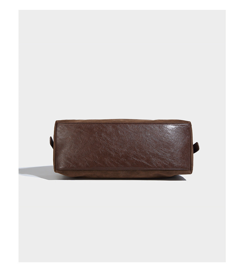 Slouchy hobo shoulder bag with turn-lock flap closure and adjustable strap, detail view 15
