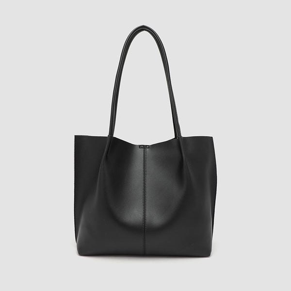 Large slouchy matte leather-look tote bag with double shoulder straps and centre seam detail, front view
