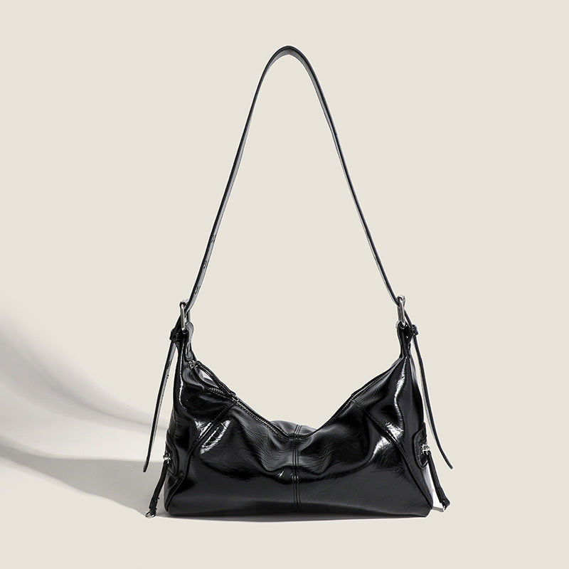 Glossy crinkled mini hobo shoulder bag with studded adjustable strap and silver-tone hardware, detail view 6