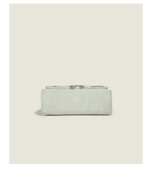 Structured rectangular chain shoulder bag with silver butterfly clasp and glossy crinkled finish, detail view 14