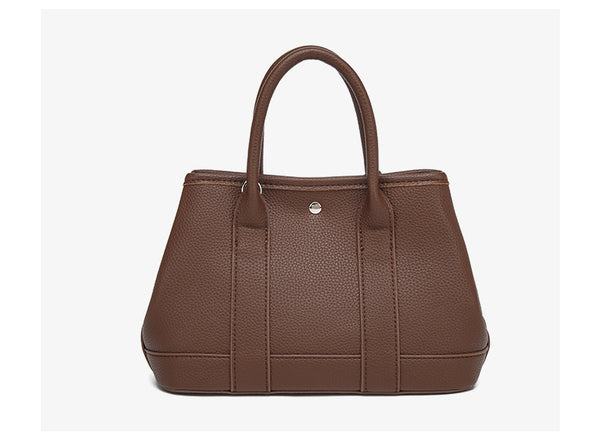 Structured pebbled leather-look top-handle tote bag with elephant charm and detachable shoulder strap, detail view 14