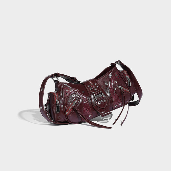 Compact glossy leather-look crossbody bag with silver studs, buckle hardware, and multiple zip pockets, detail view 30