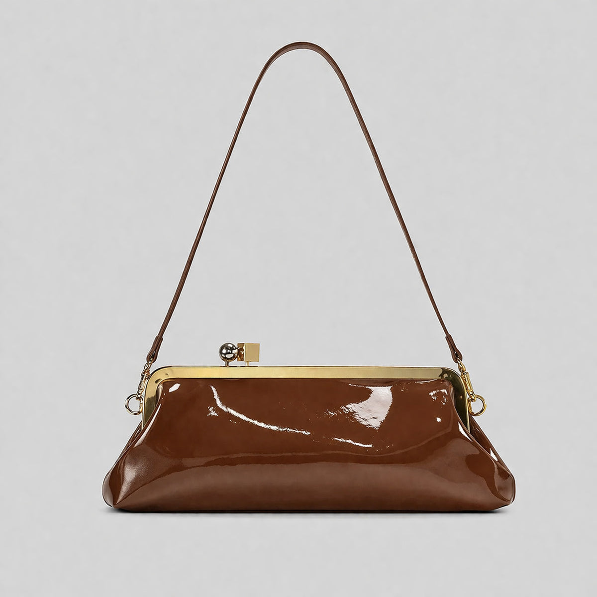 Strukturierte Clutch mit Kiss-Lock-Rahmenverschluss aus dunkelbrauner, krokodil-geprägter Lederoptik mit goldfarbenen Details und schmalem