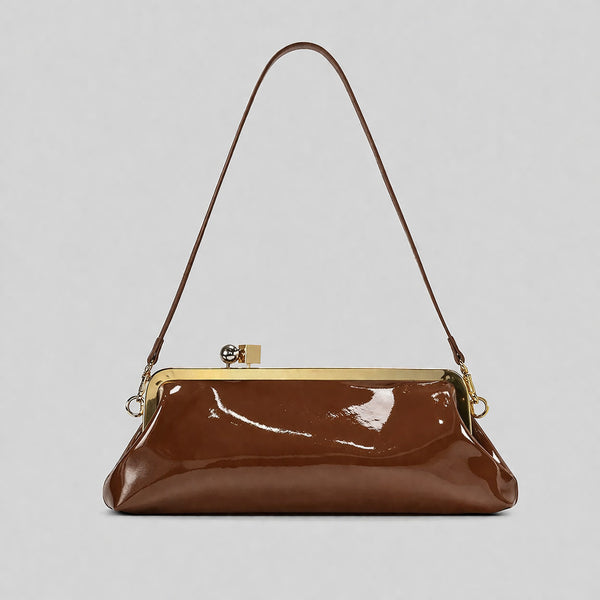 Strukturierte Clutch mit Kiss-Lock-Rahmenverschluss aus dunkelbrauner, krokodil-geprägter Lederoptik mit goldfarbenen Details und schmalem