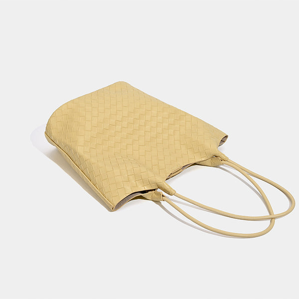 Large woven-texture open-top tote bag with single shoulder strap in butter yellow, detail view 3
