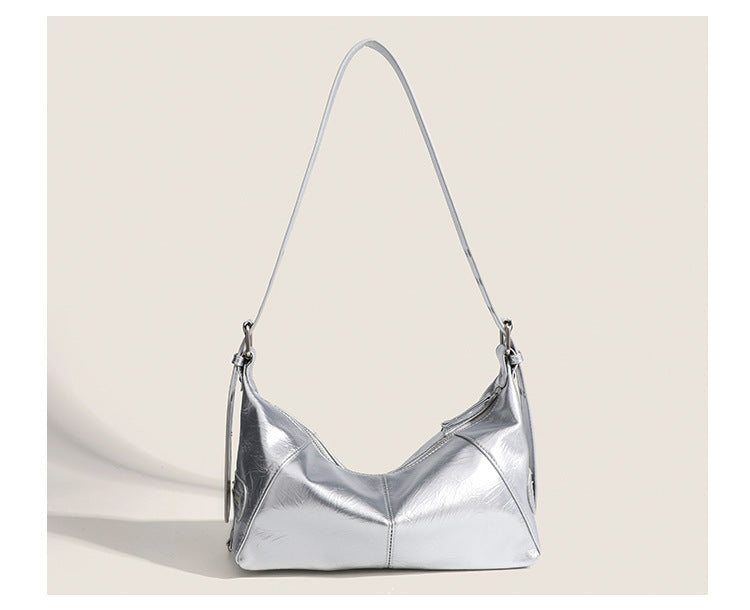 Glossy crinkled mini hobo shoulder bag with studded adjustable strap and silver-tone hardware, detail view 15