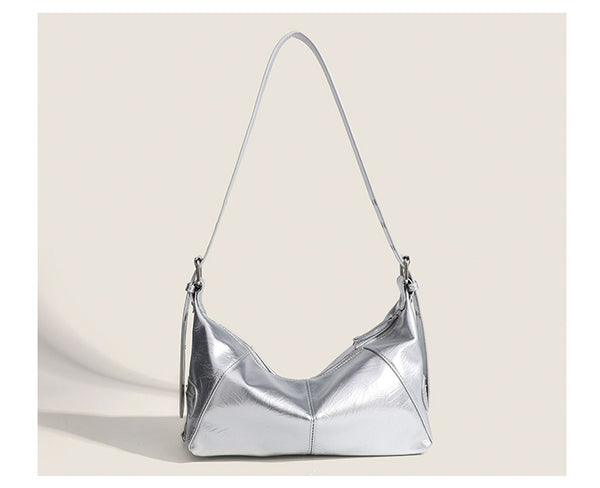 Glossy crinkled mini hobo shoulder bag with studded adjustable strap and silver-tone hardware, detail view 15