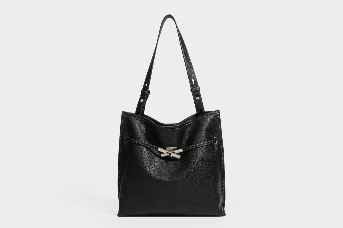 Pebbled leather-look tote bag with front toggle hardware and long shoulder strap, detail view 39