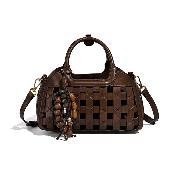 Small structured woven lattice top-handle satchel bag with bead-and-tassel charm and gold-tone hardware, detail view 5