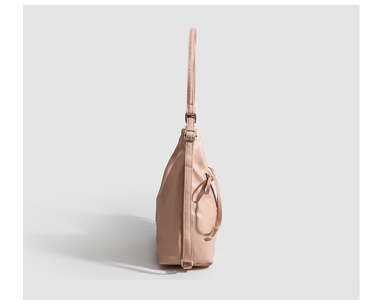 Slouchy hobo shoulder bag with bow detail and silver-tone hardware, detail view 15