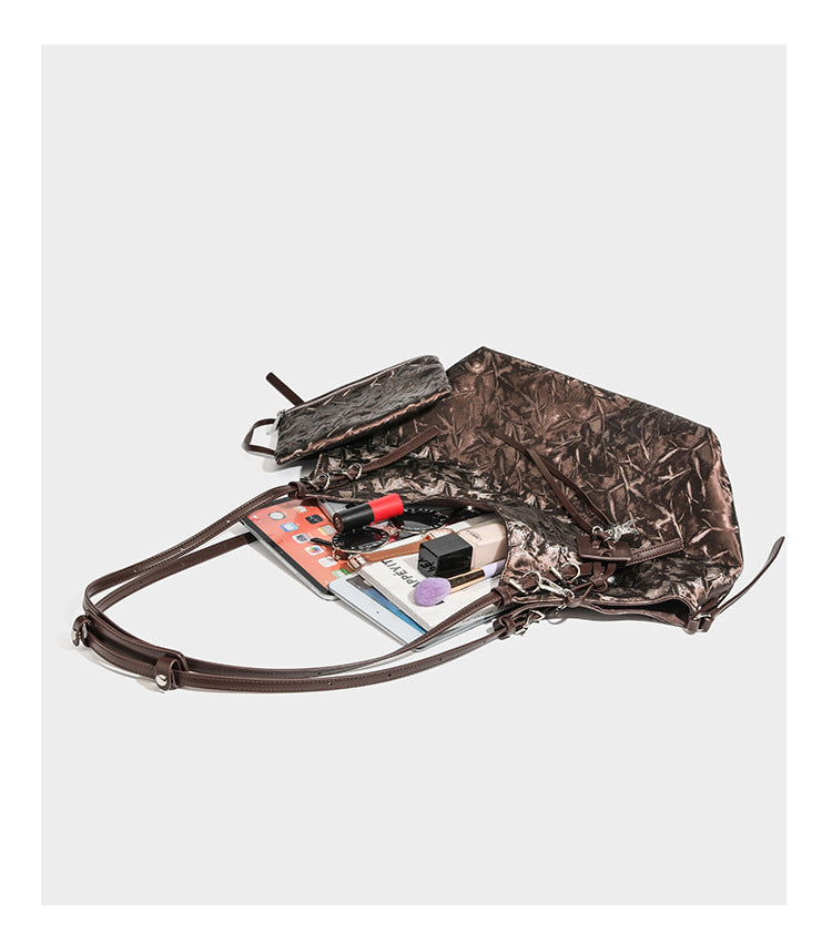 Slouchy crinkle-finish shoulder tote bag with silver hardware and attached zip pouch, detail view 13