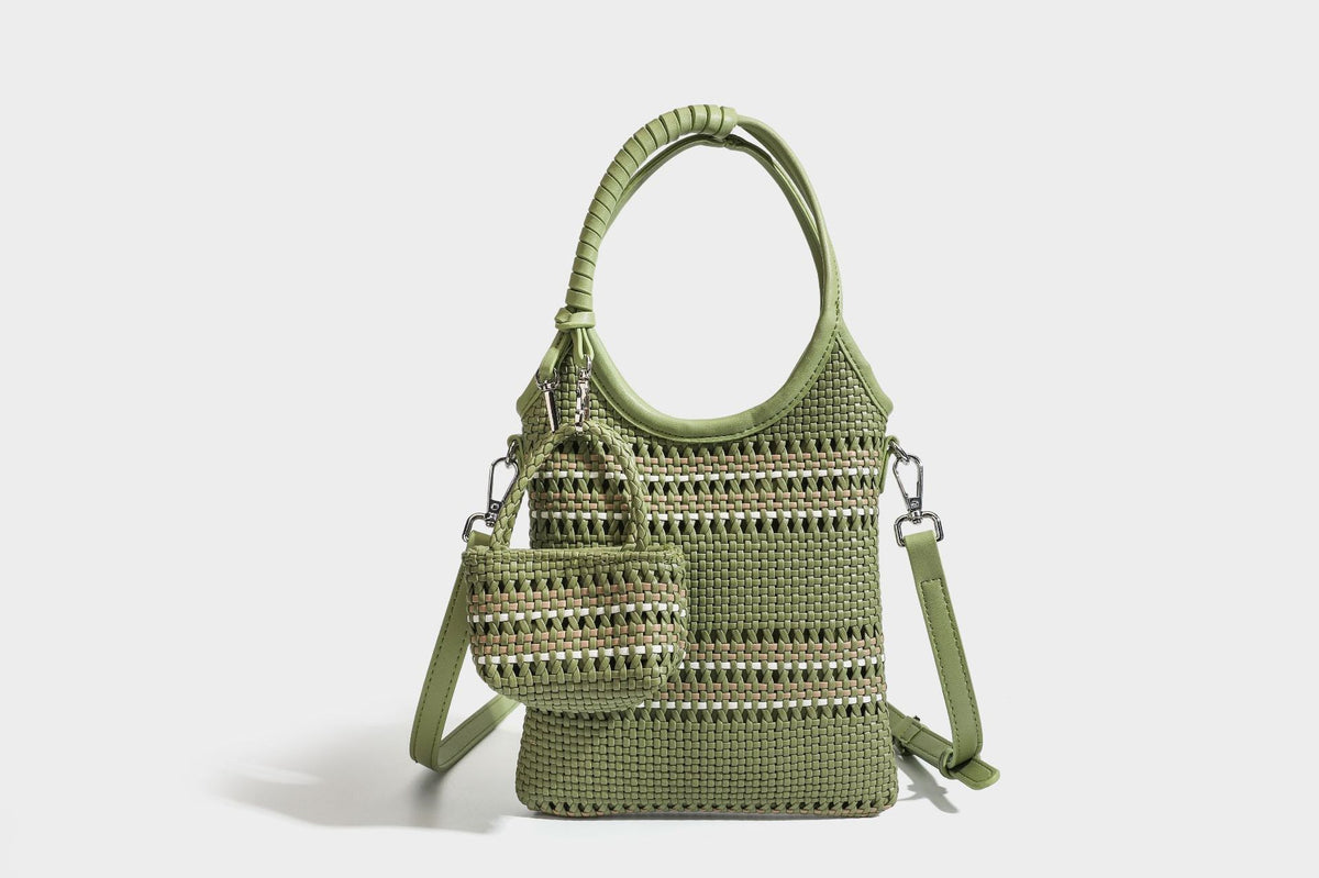 Color-block woven tote bag with rounded leather-look handles, detachable crossbody strap, and matching mini clip-on pouch in