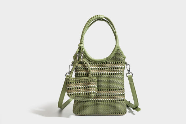 Color-block woven tote bag with rounded leather-look handles, detachable crossbody strap, and matching mini clip-on pouch in
