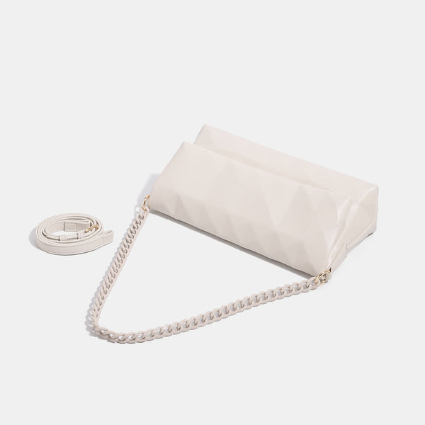 Geometric faceted flap shoulder bag with braided chain strap in black and ivory leather-look finish, detail view 4