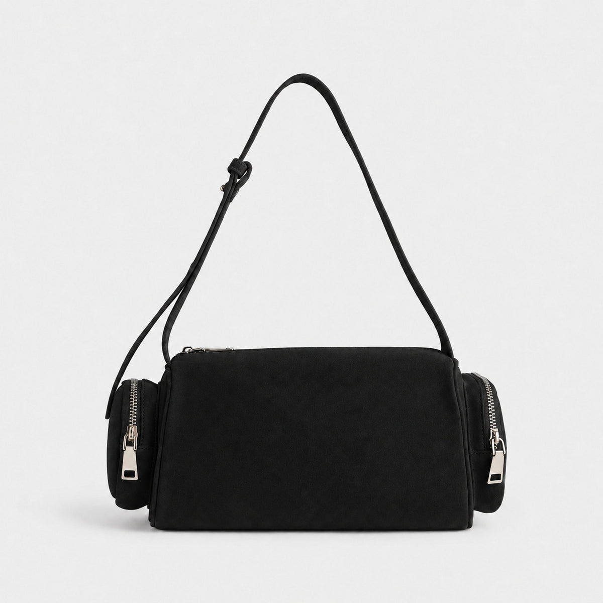 Mini barrel shoulder bag with side zip pouches and adjustable strap in pink suede-like finish, detail view 7