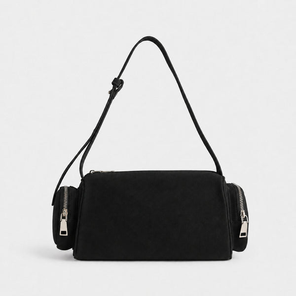 Mini barrel shoulder bag with side zip pouches and adjustable strap in pink suede-like finish, detail view 7