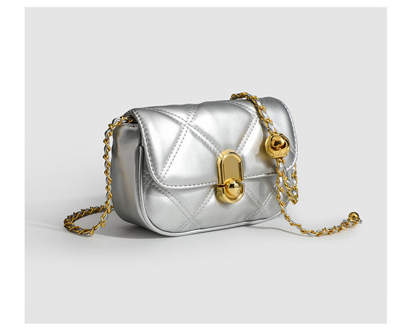 Compact diamond-quilted mini crossbody bag with gold-tone turn-lock closure and woven chain strap, detail view 17