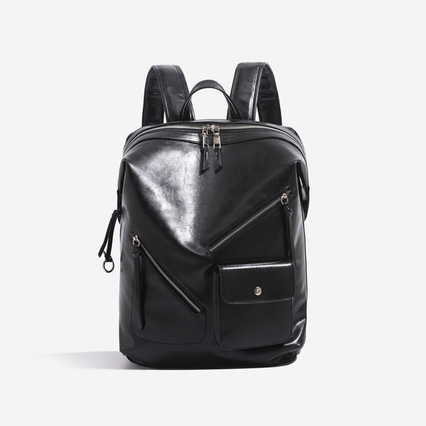 Large smooth leather-look backpack with multi-pocket front panel, dual zip closure, and silver-tone hardware, detail view 3