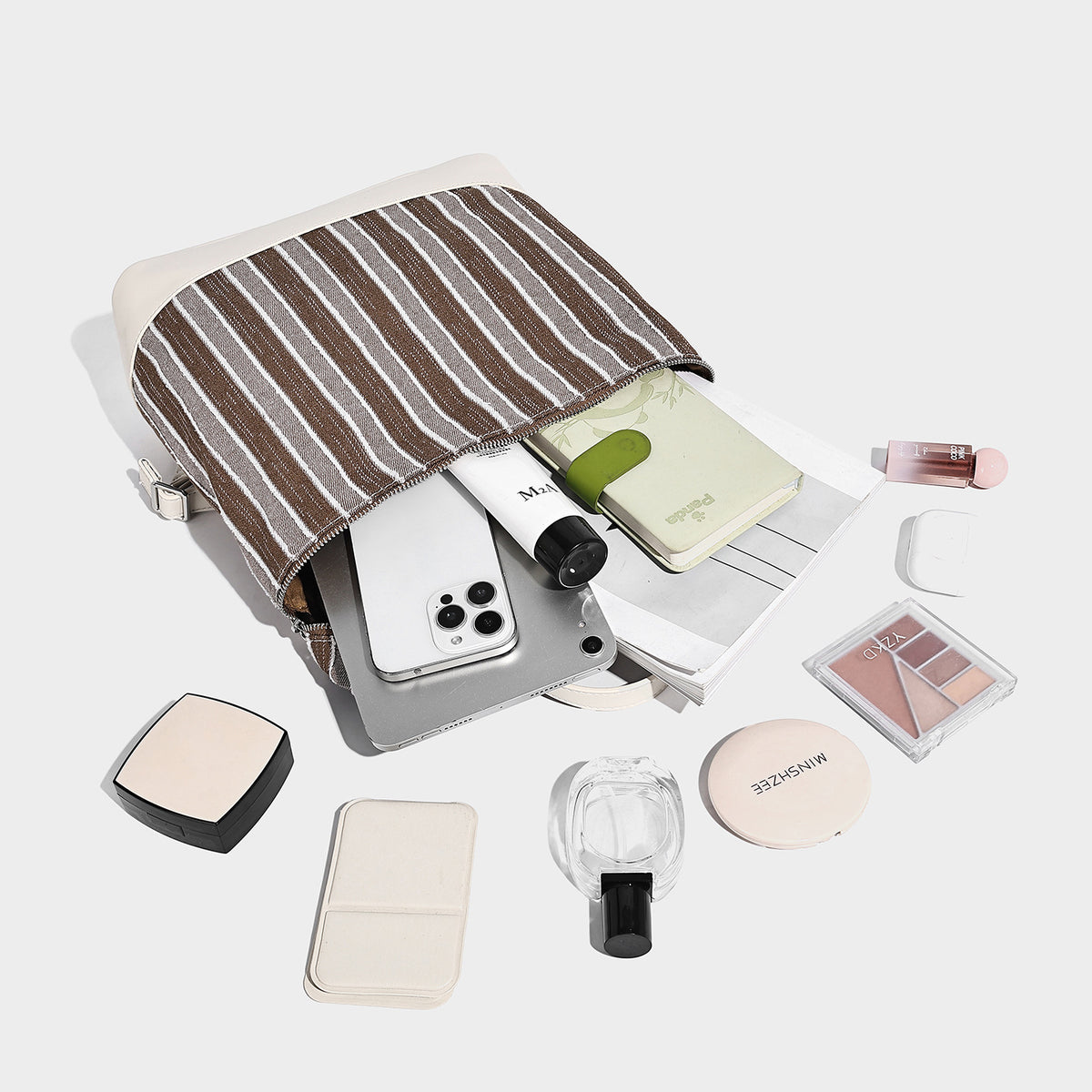 Small structured striped fabric backpack handbag with cream leather-look trim, top handle, and silver-tone hardware, detail