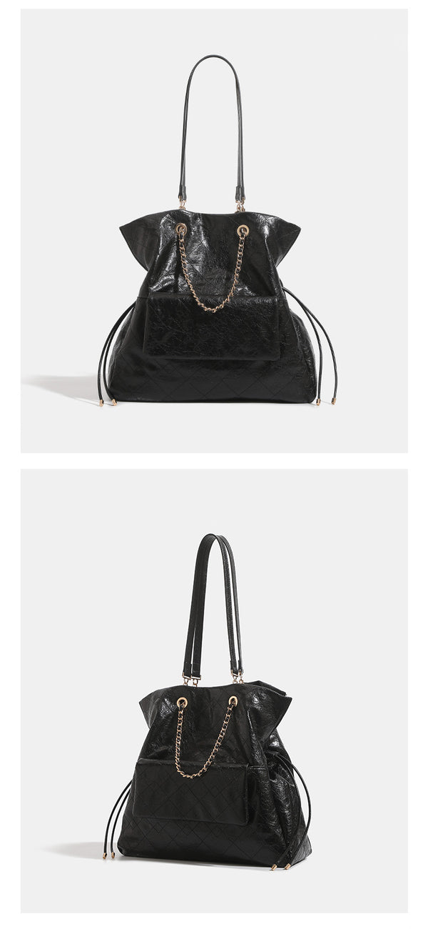 Quilted crinkled leather-look convertible tote backpack with gold-tone chain handles and drawstring closure, detail view 9