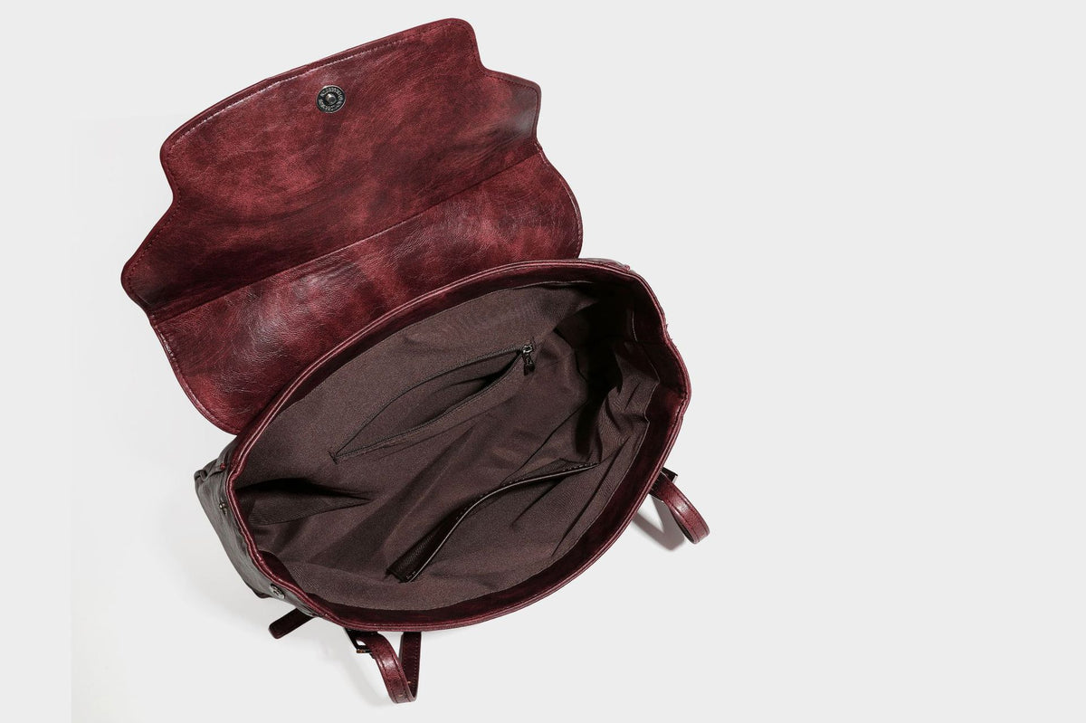 Structured flap-top shoulder tote bag in distressed leather-look finish with silver-tone buckle hardware and double shoulder