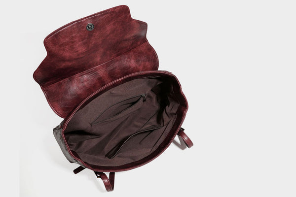Structured flap-top shoulder tote bag in distressed leather-look finish with silver-tone buckle hardware and double shoulder