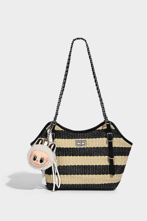 Black and natural striped woven tote bag with chain shoulder strap and silver-tone turn-lock hardware, detail view 12