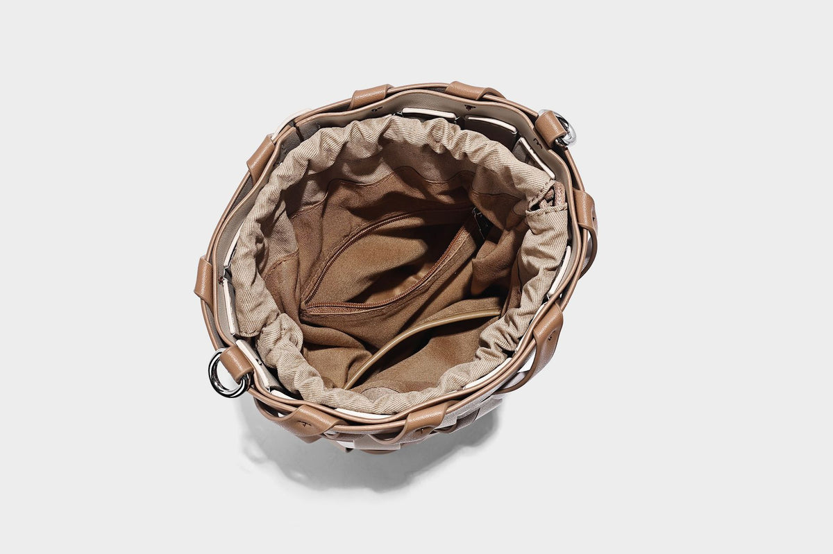 Small woven lattice bucket bag in tan and cream leather-look strips with drawstring top and detachable crossbody strap