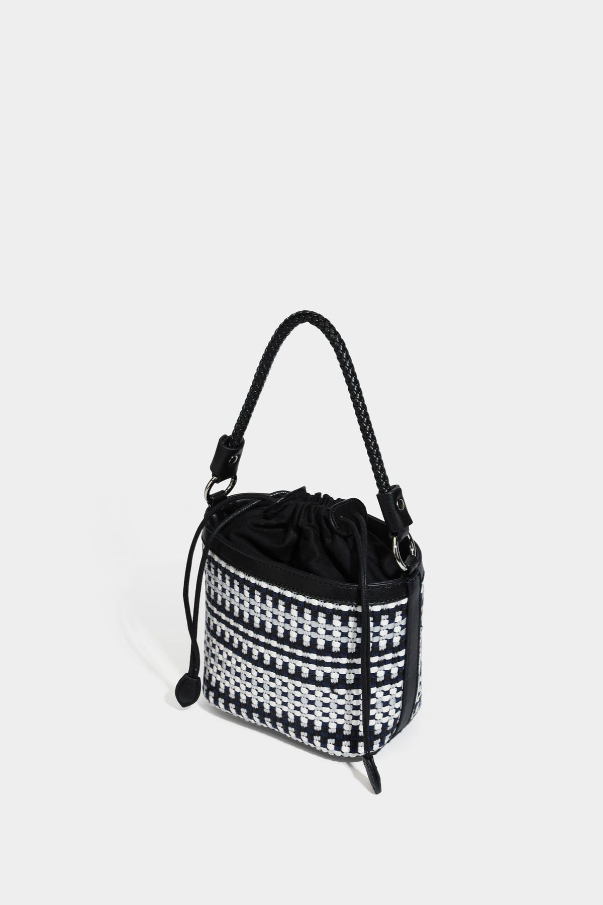 Small structured woven checker bucket bag with braided top handle, drawstring closure, and silver-tone hardware in black