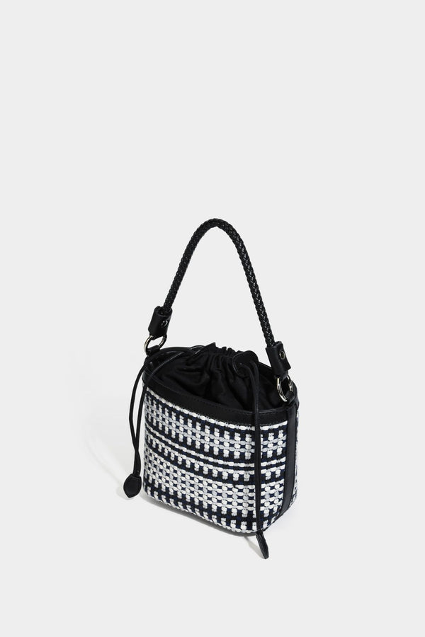 Small structured woven checker bucket bag with braided top handle, drawstring closure, and silver-tone hardware in black