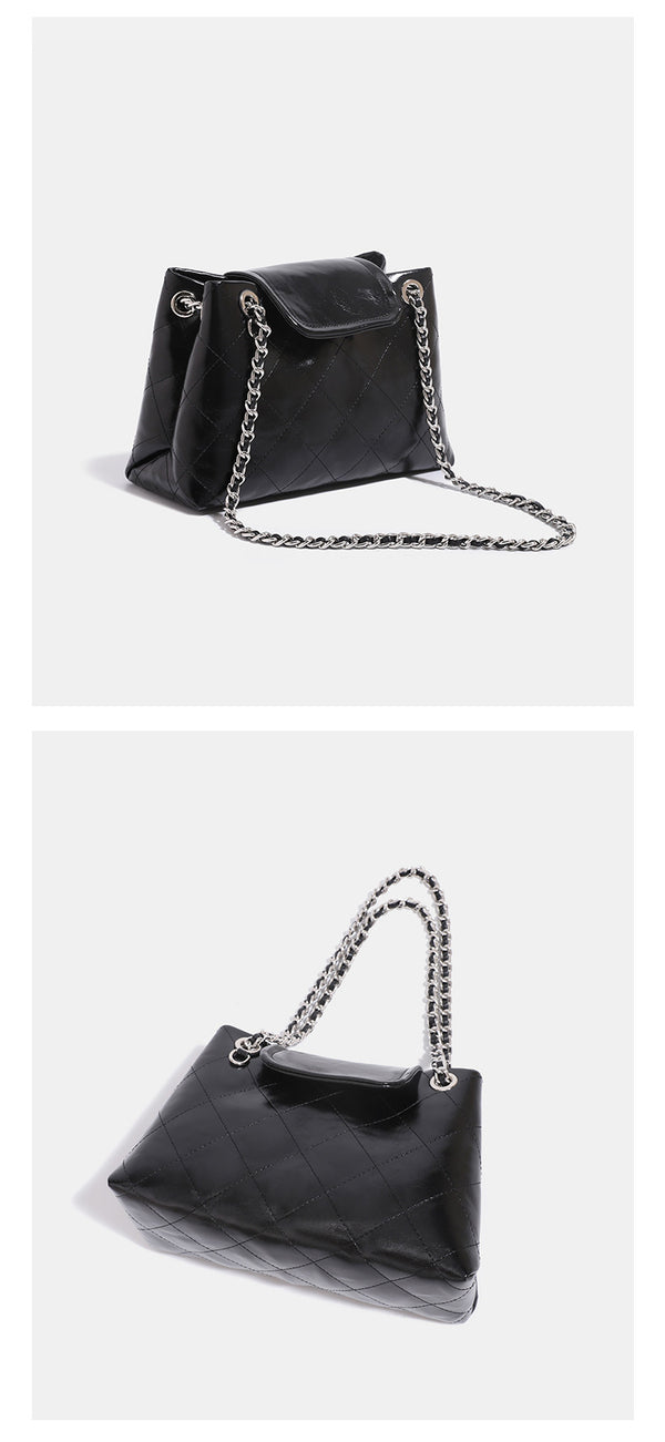 Quilted trapezoid shoulder bag with chain straps, flap closure, and ring hardware, detail view 12